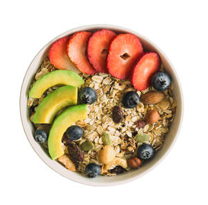 bowl of granola and fruit against a white background
