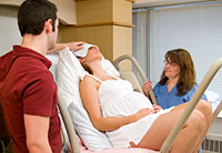 pregnant woman resting between labor contractions