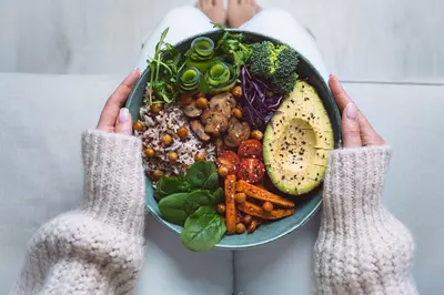 aerial view of a person holding a salad