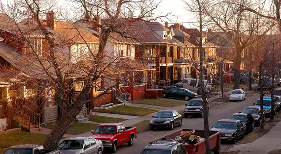 neighborhood with sun setting