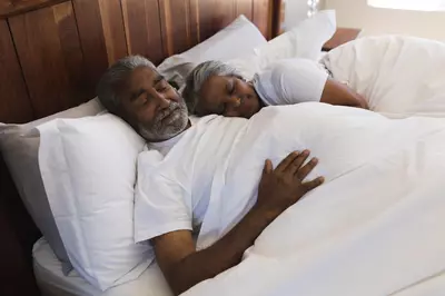 elderly couple sleeping