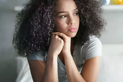 Young woman looking reflective