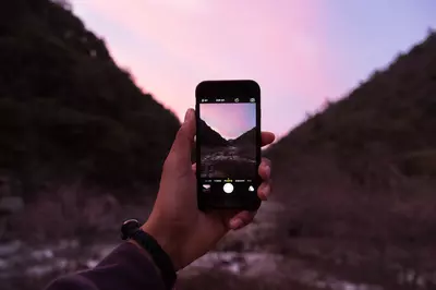 hand holding a mobile phone