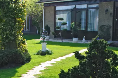 pleasant front yard and front of a house