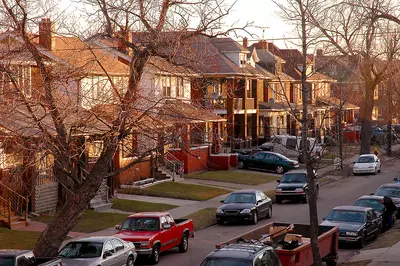 neighborhood with sun setting