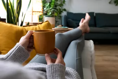 woman sitting with tea