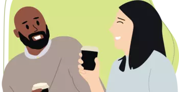 two people talking holding coffee cups