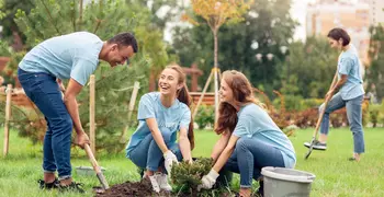 people having fun gardening together