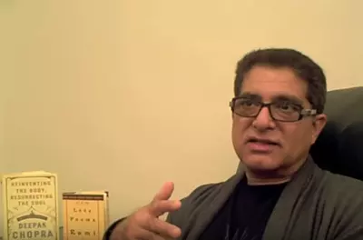 Deepak Chopra speaking into the camera