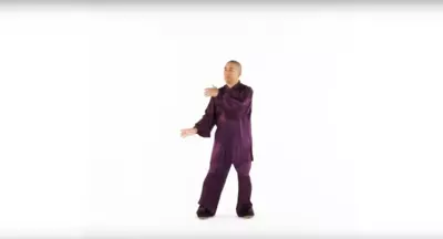 Man practicing traditional Tai Chi.